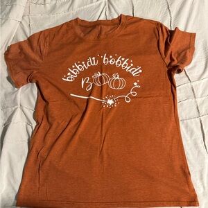 10 Items for $20: Orange Graphic Tee with Halloween Design